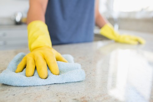 A cleaner preparing a spotless kitchen in Wimbledon home